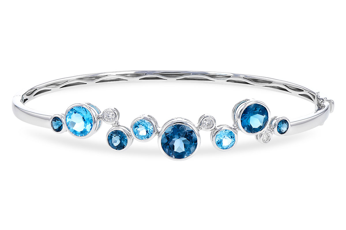 B291-82216: BANGLE 3.95 TW BLUE TOPAZ 4.06 TGW